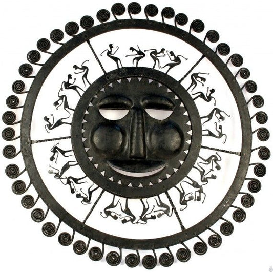 Wrought iron sun with dancing tribals